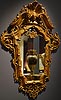 A superb pair of Italien Régence carved gilt wood mirrors